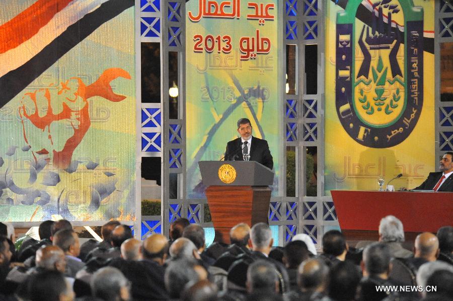 A handout picture released by the Egyptian presidency shows Egyptian President Mohamed Morsi addressing a ceremony marking Labour Day in Cairo on April 30, 2013. (Xinhua/Egyptian Presidency)