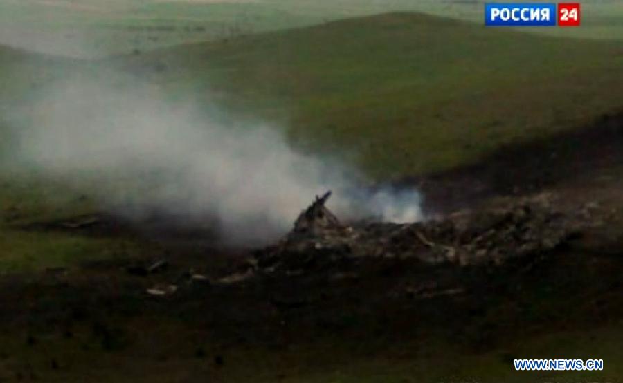 Video frame from Russian state television shows the scene after a U.S. military plane crashed in Kyrgyzstan on May 3, 2013. A U.S. military plane crashed Friday in Kyrgyzstan, the country's emergency situations ministry said. There was no immediate word on any casualties but the ministry said preliminary information indicated that there were five people aboard. (Xinhua) 