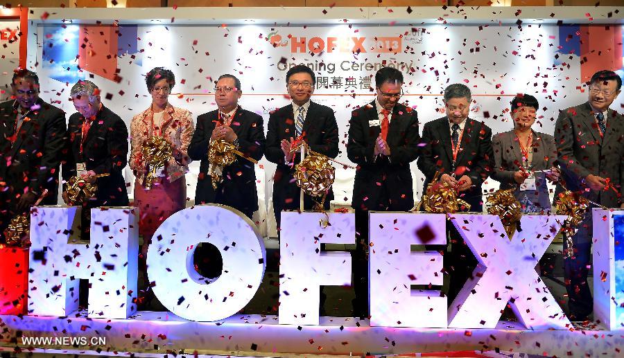 Honored guests cut ribbon at the opening ceremony of the 15th International Exhibition of Food & Drink, Hotel, Restaurant & Food Service Equipment, Supplies & Services (HOFEX) in south China's Hong Kong, May 7, 2013. The four-day HOFEX 2013 kicked off on Tuesday at Hong Kong Convention & Exhibition Center. (Xinhua/Chen Xiaowei)