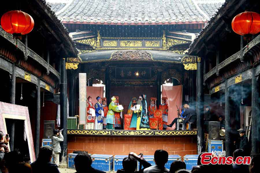 Ganju Opera is performed at the Mingfentang Stage in Huyan Village, Zhenqiao County, Leping City, Jiangxi Province. The Ganju Opera is a local opera popular in many areas of Jiangxi. The Mingfentang Stage, which was built in Qing Dynasty with the construction beginning in 1817, has been listed as a key cultural heritage site under state protection. (CNS/Cheng Wanhai)