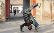 Photo story: Little boy walking on his hands