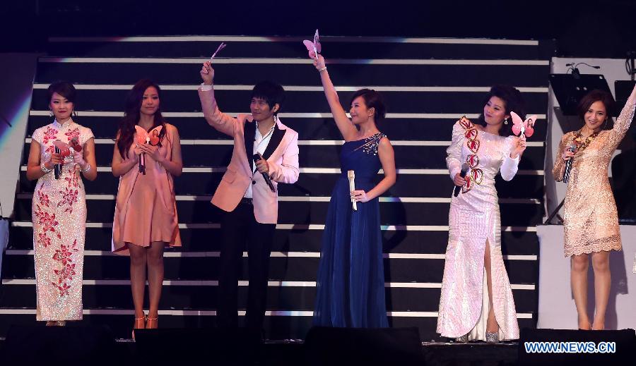 Singers perform during a memorial concert for Teresa Teng (1953-1995), one of the most famous pop singers in China, in the Taipei Arena in Taipei, southeast China's Taiwan, May 12, 2013. (Xinhua/Xie Xiudong) 