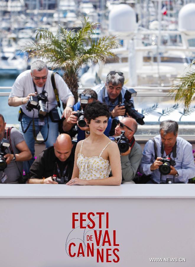 French actress Audrey Tautou poses for a photocall event one day before the opening of the 66th Cannes Film Festival in Cannes, France, on May 14, 2013. Audrey Tautou will host the opening and closing ceremonies of the Festival this year. (Xinhua/Zhou Lei) 