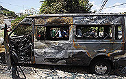 Burnt vehicles seen in Umm al-Qutuf,Israel