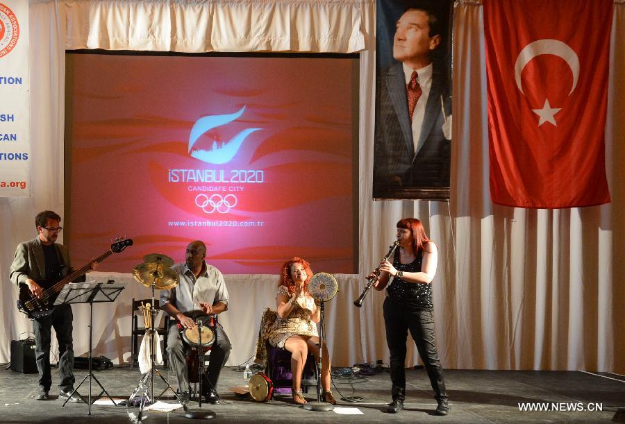 A Turkish music band performs during the "Turkish Day", organized by the Federation of Turkish American Associations (FTAA), at Grand Central Terminal in New York, May 14, 2013. (Xinhua/Wang Lei) 
