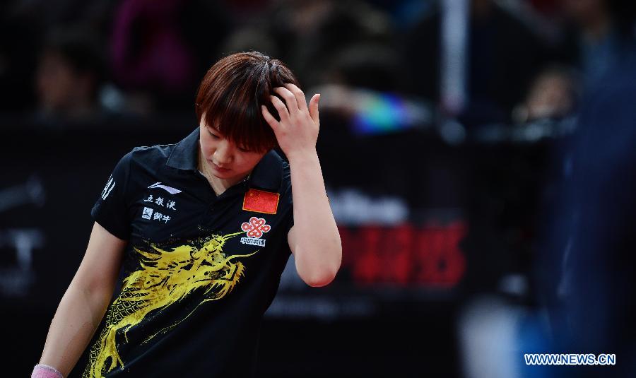 Chen Meng of China reacts during the women's singles first round match against Marina Berho of France at the 2013 World Table Tennis Championships in Paris, France, May 15, 2013. Chen Meng won 4-0. (Xinhua/Tao Xiyi)