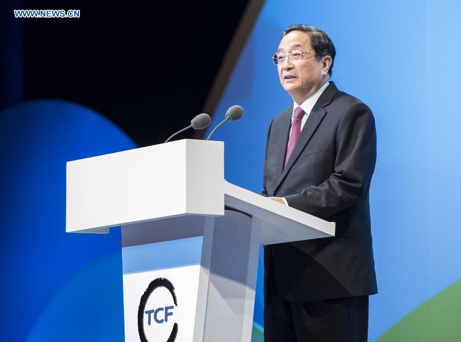 Yu Zhengsheng, chairman of the National Committee of the Chinese People's Political Consultative Conference, delivers a keynote speech at the opening ceremony of the second session of the World Cultural Forum (Taihu, China) in Hangzhou, capital of east China's Zhejiang Province, May 18, 2013. (Xinhua/Wang Ye)
