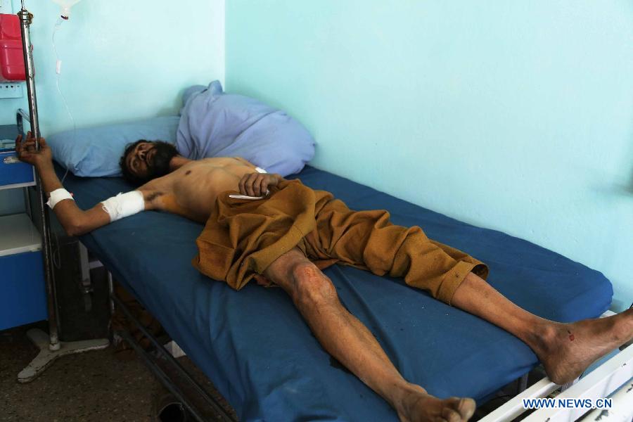A wounded Afghan receives treatment at a hospital in Ghazni province, east Afghanistan, on May 22, 2013. One Afghan civilian was killed and five others were wounded Wednesday morning when an improvised bomb went off in Ghazni city, the provincial capital of eastern Ghazni province, police said. (Xinhua/Rahmat)