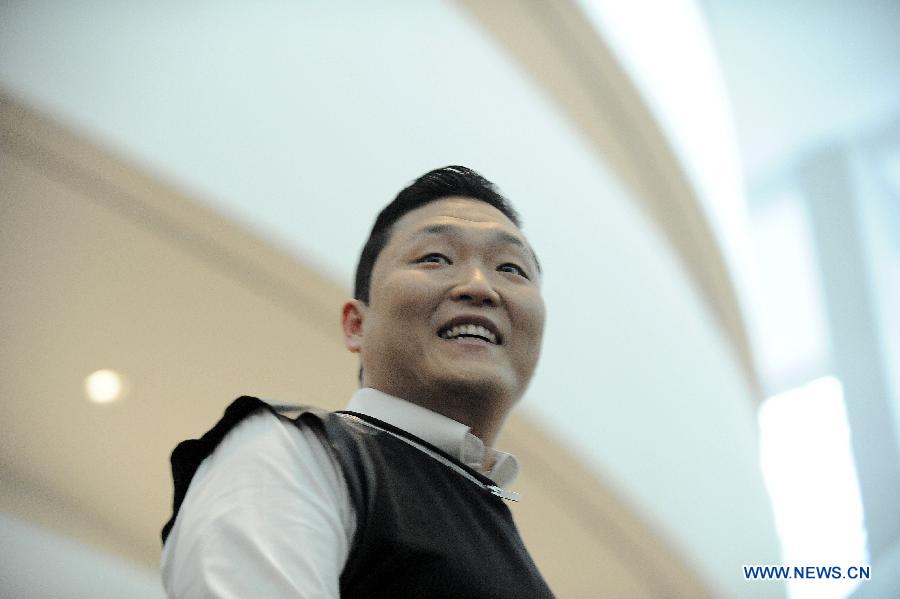 South Korean singer PSY attends a press conference for the Social Star Awards in Singapore's Marina Bay Sands Theatre, on May 22, 2013. The inaugural Social Star Awards ceremony will be held Thursday in Singapore and the Singapore Social Concerts will be held in Singapore on May 24 and May 25. (Xinhua/Then Chih Wey)