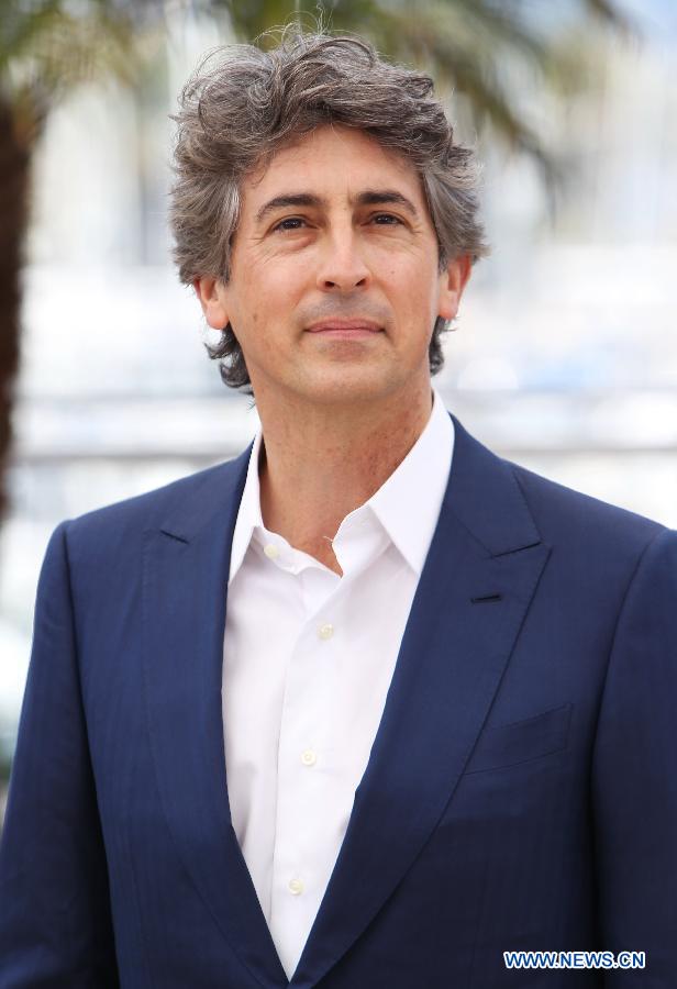 Director Alexander Payne poses during a photocall for the film "Nebraska" presented in Competition at the 66th edition of the Cannes Film Festival in Cannes, France, May 23, 2013. (Xinhua/Gao Jing) 