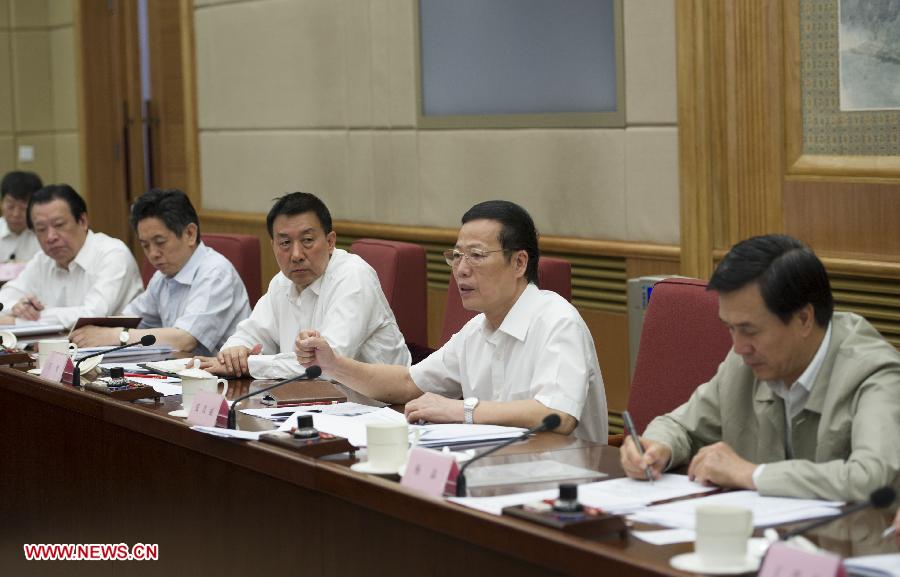 Chinese Vice Premier Zhang Gaoli (2nd R), who is also a member of the Standing Committee of the Political Bureau of the Communist Party of China (CPC) Central Committee, presides over a meeting on rebuilding the areas hit by the earthquake jolting southwest China's Sichuan Province last month, in Beijing, capital of China, May 24, 2013. (Xinhua/Xie Huanchi)