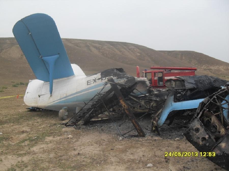 Photo taken on May 24, 2013 shows the wreckage of an AN-2 plane crashed in Jalal-Abad region, Kyrgyzstan. The aircraft crashed here Friday, killing three. (Xinhua) 