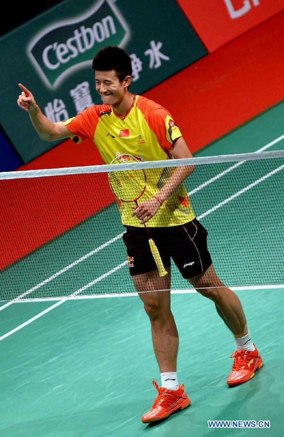 China's Chen Long celebrates after winning the men's singles match against South Korea's Lee Dong Keun at the finals of the Sudirman Cup World Team Badminton Championships in Kuala Lumpur, Malaysia, on May 26, 2013. Chen Long won 2-0. (Xinhua/Chen Xiaowei)