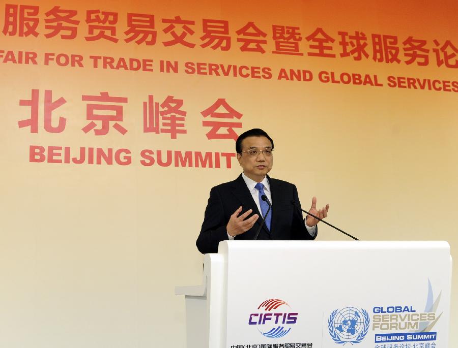 Chinese Premier Li Keqiang delivers a speech at the 2nd China Beijing International Fair for Trade in Services (CIFITIS) and Global Services Forum-Beijing Summit in Beijing, capital of China, May 29, 2013. (Xinhua/Rao Aimin)