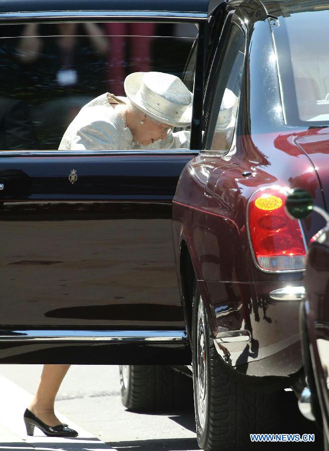 British Queen Elizabeth II gets into a car to leave Westminster Abbey after a ceremony celebrating the 60th anniversary of the Coronation of the Queen in London, capital of Britain, on June 4, 2013. (Xinhua/Yin Gang)