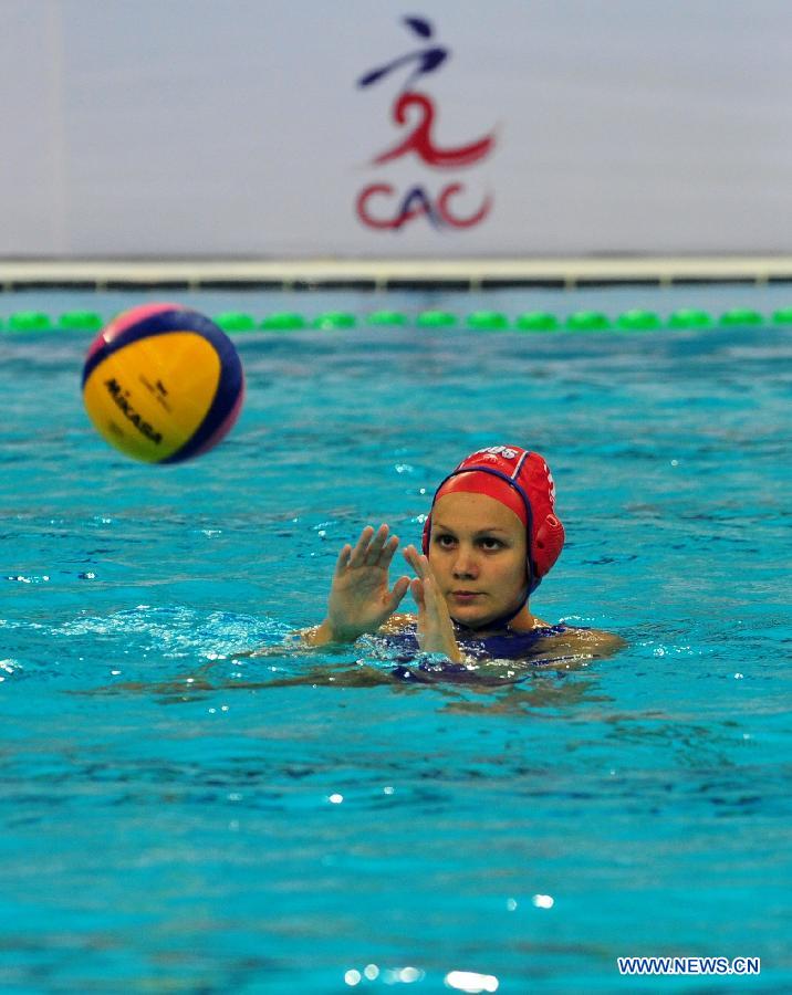 Karnaukh Anna of Russia competes during the semifinal against Hungary at the 2013 FINA Women's Water Polo World League Super Final in Beijing, capital of China, June 5, 2013. Russia won 12-9. (Xinhua/He Changshan)