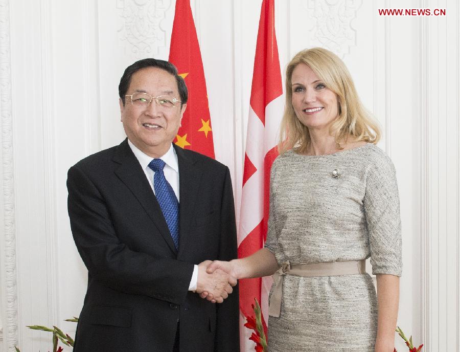 Yu Zhengsheng (L), chairman of the National Committee of the Chinese People's Political Consultative Conference, meets with Danish Prime Minister Helle Thorning-Schmidt in Copenhagen, Denmark, June 6, 2013. (Xinhua/Li Xueren) 
