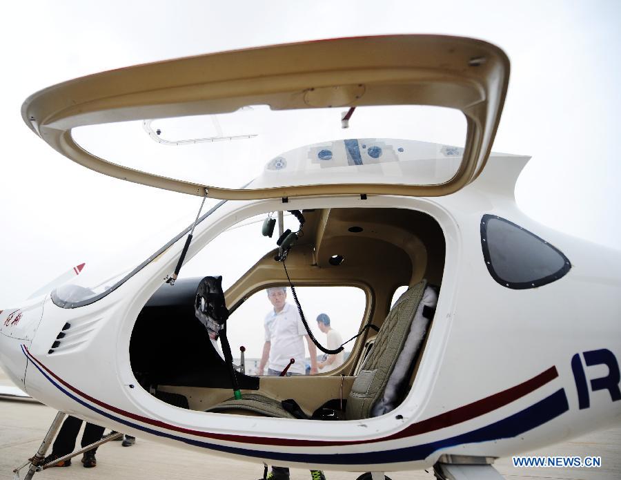 Photo taken on June 6, 2013 shows the cockpit of an electric two-seater light sport airplane at the Caihu Airport in Shenyang, capital of northeast China's Liaoning Province. The lithium-battery-powered aircraft, independently-developed by Shenyang Aerospace University, had a successful test flight Friday. (Xinhua/Yang Qing)