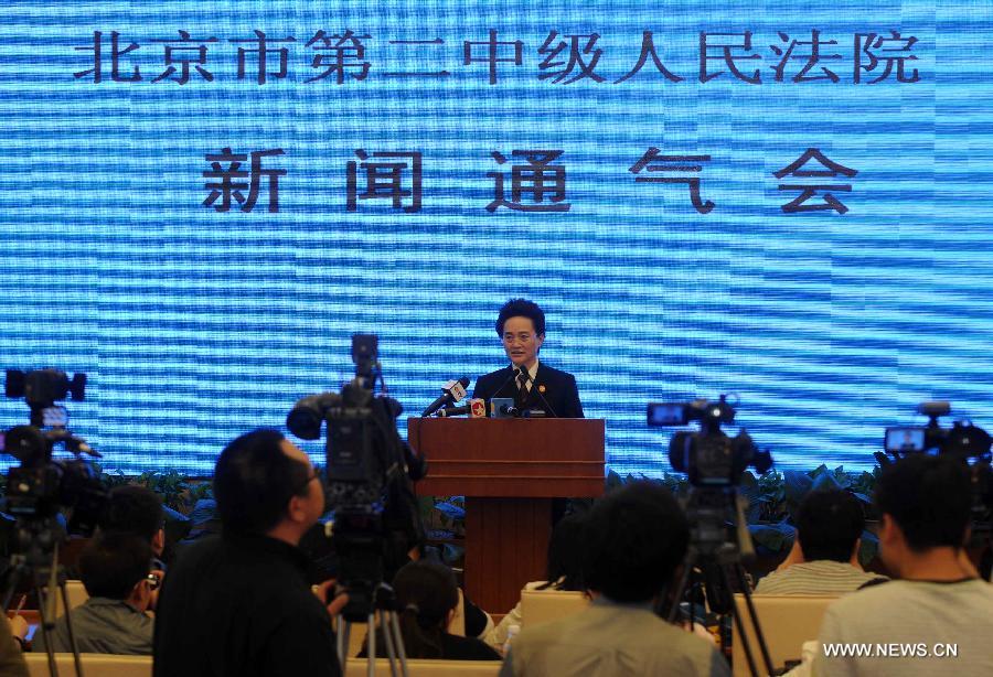 Guo Peng, an official of the Beijing Second Intermediate People's Court, introduces the details of the case of China's former railways minister Liu Zhijun at a press conference in Beijing, capital of China, June 9, 2013. Liu stood trial in the court in Beijing on Sunday on charges of bribery and abuse of power. (Xinhua/Gong Lei)