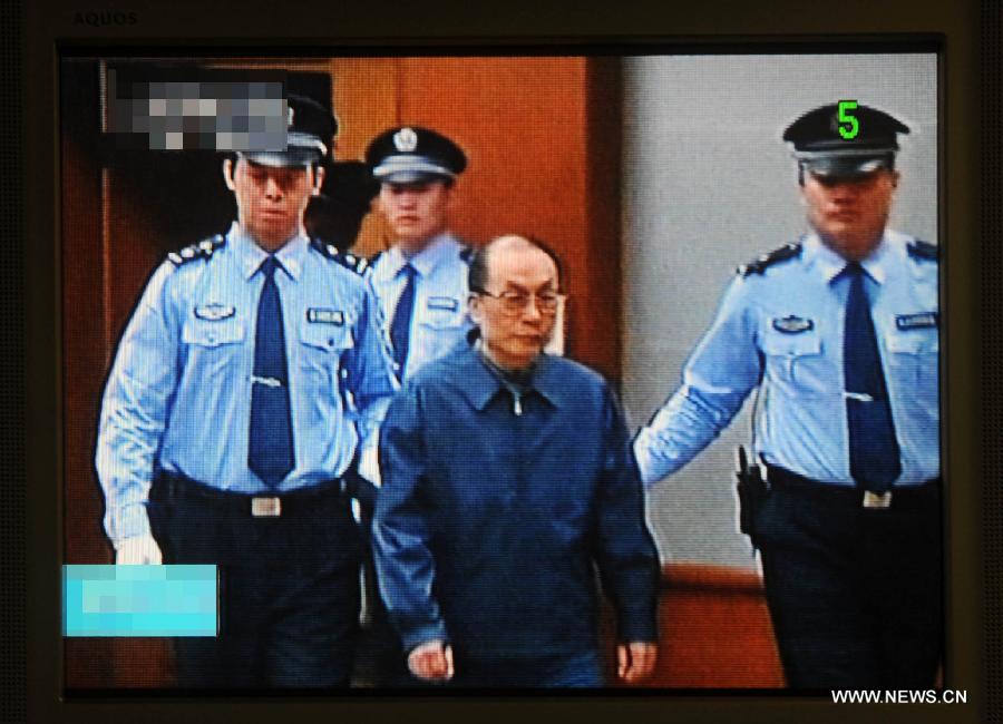 Video grab shows China's former railways minister Liu Zhijun being brought into the Beijing Second Intermediate People's Court in Beijing, capital of China, June 9, 2013. Liu stood trial in the court on Sunday on charges of bribery and abuse of power. (Xinhua/Gong Lei)