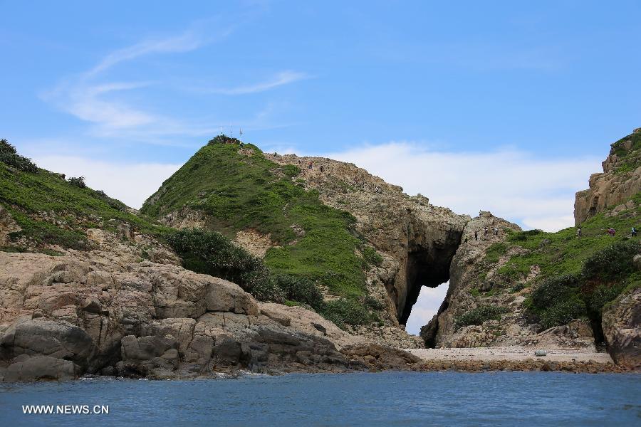 Photo taken on June 9, 2013 shows the scenery of the South Ninepin Island of the Ninepin Group in Hong Kong, south China. The Ninepin Group, or Kwo Chau Islands, is a group of islands in the southeastern Hong Kong. (Xinhua/Li Peng) 