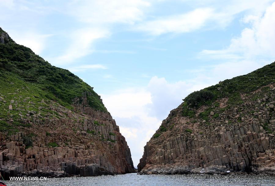 Photo taken on June 9, 2013 shows the scenery of the North Ninepin Island of the Ninepin Group in Hong Kong, south China. The Ninepin Group, or Kwo Chau Islands, is a group of islands in the southeastern Hong Kong. (Xinhua/Li Peng)