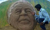 Sand sculpture of Nelson Mandela