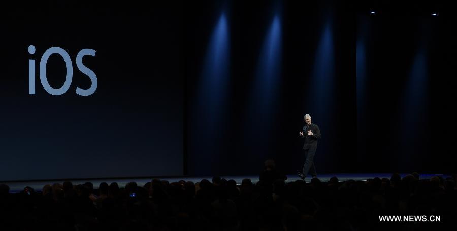 Apple CEO Tim Cook addresses the 2013 Apple WWDC at the Moscone Center in San Francisco, California, the United States, on June 10, 2013. (Xinhua)