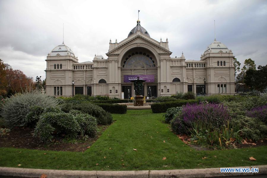 Photo taken on June 12, 2013 shows the Royal Exhibition Building and its surrounding Carlton Gardens in Melbourne, Australia. The Royal Exhibition Building and its surrounding Carlton Gardens were designed for the great international exhibitions of 1880 and 1888 in Melbourne. The Building is constructed of brick and timber, steel and slate. It combines elements from the Byzantine, Romanesque, Lombardic and Italian Renaissance styles. The Royal Exhibition Building and Carlton Gardens were listed by United Nations Educational, Scientific and Cultural Organization (UNESCO) as a world heritage in 2004. (Xinhua/Xu Yanyan) 