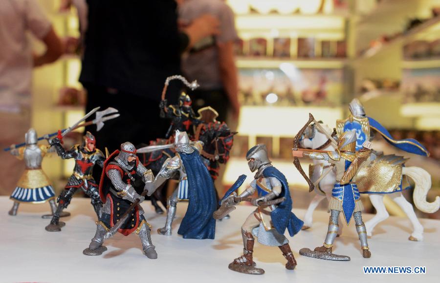 Ancient knight figures are displayed at the annual International Tokyo Toy Show on June 13, 2013. The International Toy Show kicked off here on Thursday. (Xinhua/Ma Ping) 