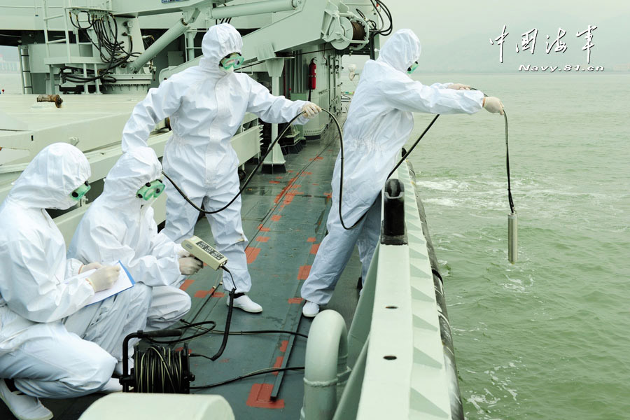 China's first maritime NBC emergency rescue team under a submarine base of the North Sea Fleet of Chinese navy conducts training in a sea area. The training subjects included real-time monitoring, sample collection and analysis and contaminated areas delineation. (China Military Online/Yu Hang, Yu Haitao)