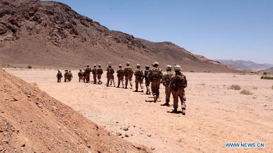 U.S. soldiers particiapte in the multinational training military exercise, codenamed Eager Lion, at the city of Quweira, 290 km south of Amman, Jordan, on June 16, 2013. (Xinhua/Mohammad Abu Ghosh)