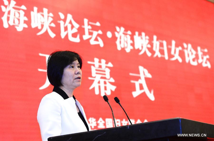 Shen Yueyue, vice chairwoman of the Standing Committee of the National People's Congress and president of the All-China Women's Federation, addresses the opening ceremony of a sub-forum themed on women of the fifth Straits Forum in Xiamen, southeast China's Fujian Province, June 16, 2013. (Xinhua/Zhang Guojun)
