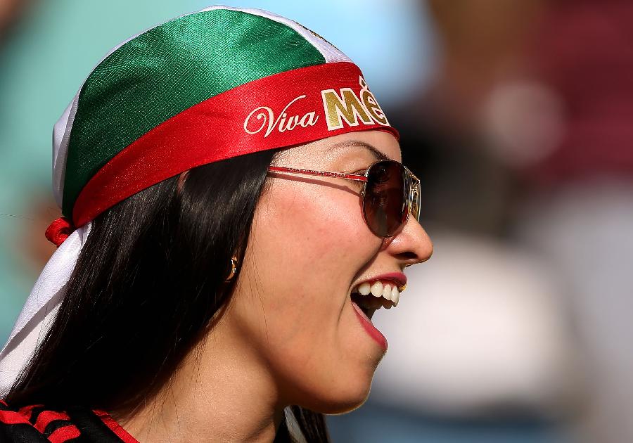 A Mexico's fan reacts prior to the FIFA's Confederations Cup Brazil 2013 match against Italy held at the Maracana Stadium, in Rio de Janeiro, Brazil, on June 16, 2013. (Xinhua/Liao Yujie) 