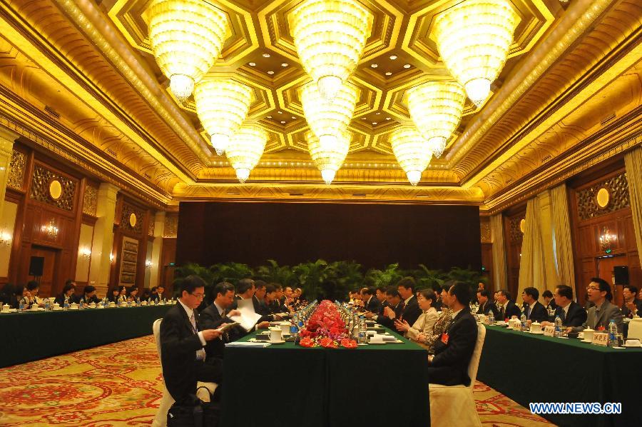 The ninth round of talks between the mainland-based Association for Relations Across the Taiwan Straits (ARATS) and the Taiwan-based Straits Exchange Foundation (SEF) is held in Shanghai, east China, June 21, 2013. (Xinhua/Chen Yehua)
