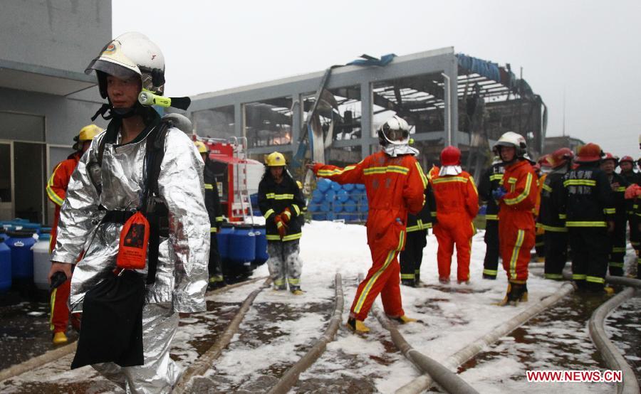 Fire fighters work to put out a fire caused by an explosion at a chemical plant in the Jinshan district of east China's Shanghai, June 24, 2013. Six people were injured in the accident at about 2:15 p.m. The fire has been extinguished as of 3:30 p.m..(Xinhua/Pei Xin) 