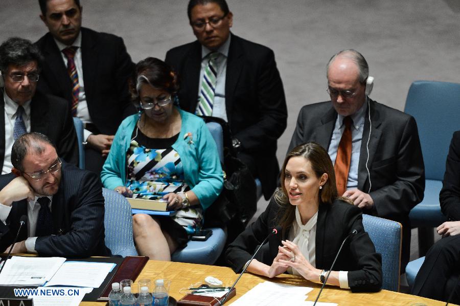 Actress Angelina Jolie (front R), the Special Envoy of the United Nations High Commissioner for Refugees (UNHCR), attends a UN Security Council meeting at the UN headquarters in New York, on June 24, 2013. Jolie on Monday urged the UN Security Council to tackle sexual violence in war zones, promoting strong actions from the international community on this issue. (Xinhua/Niu Xiaolei)