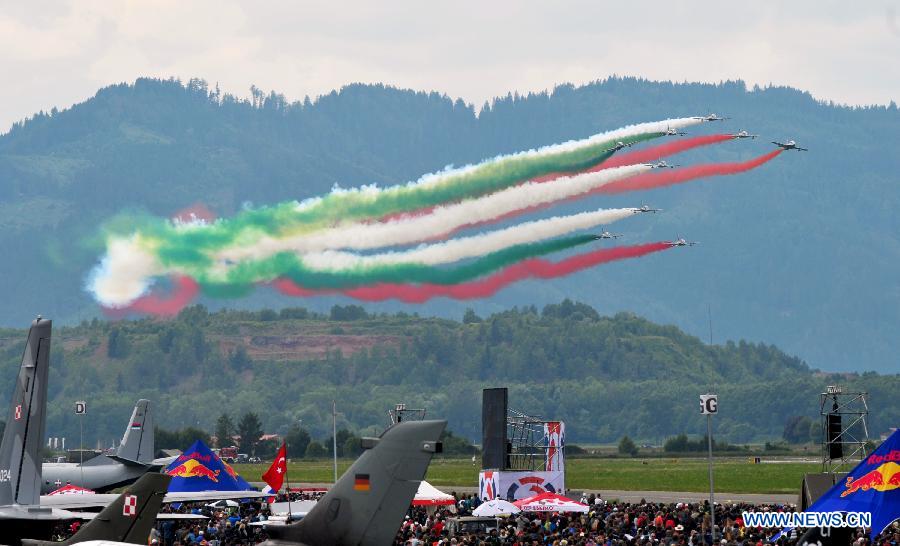 "Frecce Tricolori", the Italian airforce aerobatic display team, perform during the Airpower 13 air show in Zeltweg, Steiermark of Austria, June 28, 2013. (Xinhua/Qian Yi) 