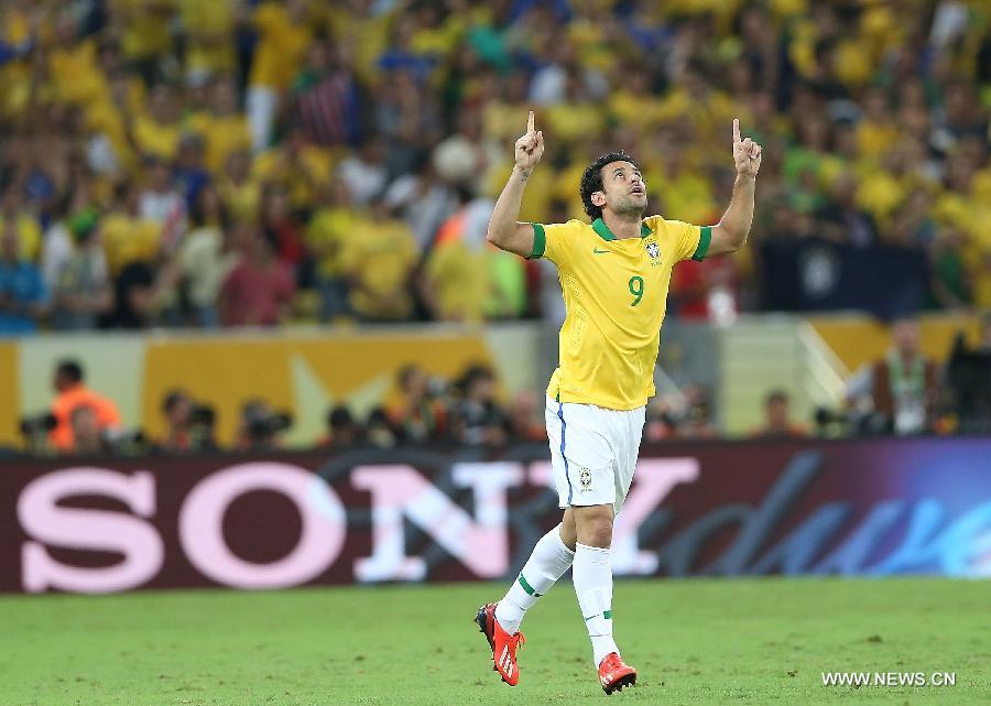 Brazil's Fred celebrates after scoring during the final of the FIFA's Confederations Cup Brazil 2013 match against Spain, held at Maracana Stadium, in Rio de Janeiro, Brazil, on June 30, 2013. (Xinhua/Liao Yujie)
