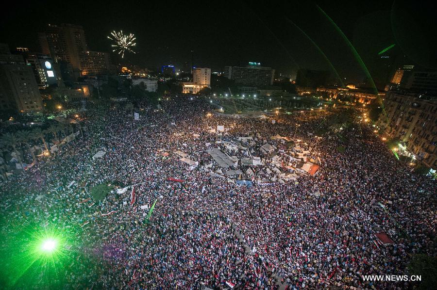 Opponents of Egyptian President Mohammed Morsi gather at Cairo's Tahrir Square, Egypt, on July 3, 2013. The chairman of Egypt's Supreme Constitutional Court will run the country for a transitional period, military chief said in a televised speech on Wednesday. (Xinhua/Li Muzi)