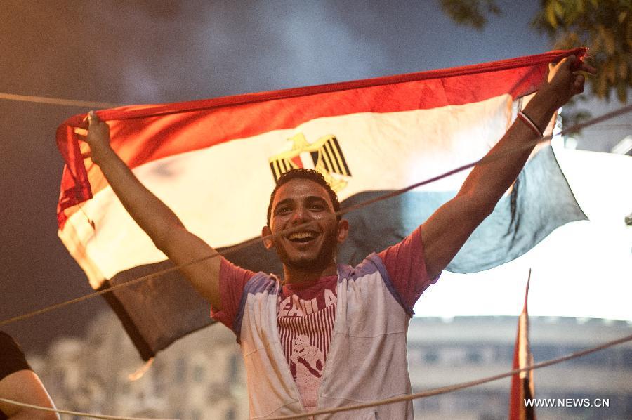 Opponents of Egyptian President Mohammed Morsi gather at Cairo's Tahrir Square, Egypt, on July 3, 2013. Egyptian interior ministry expressed complete support to a military statement that revealed a roadmap for running the country after the ouster of Islamist President Mohamed Morsi, the ministry said in a statement Wednesday. (Xinhua/Li Muzi)
