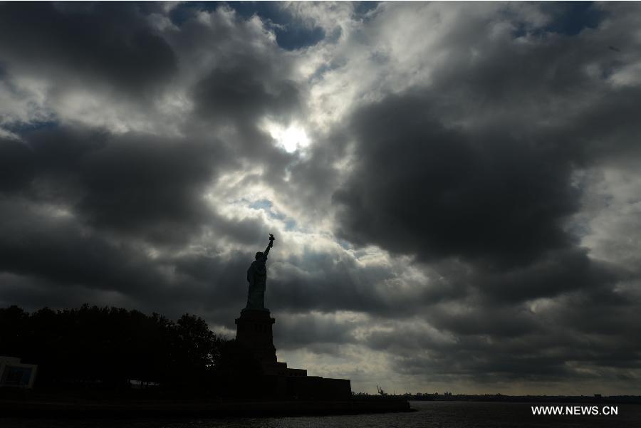 The Statue of Liberty is seen on the Liberty Island in New York, the United States, on July 4, 2013, the U.S. Independence Day. The Statue of Liberty and Liberty Island reopened to the public on Thursday for the first time since Hurricane Sandy made landfall on Oct. 29, 2012. (Xinhua/Wang Lei)