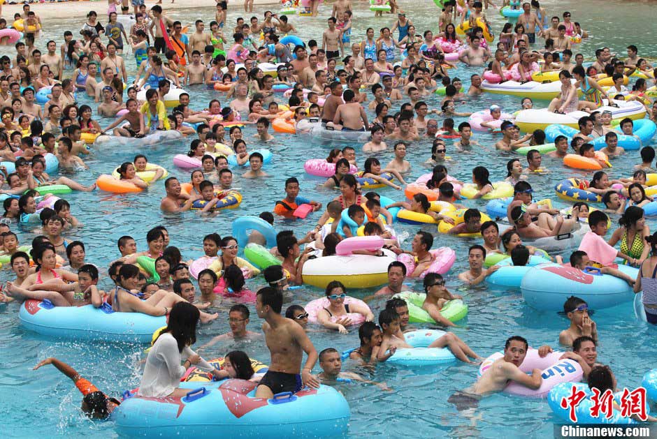 People play at the Water World in southwest China’s Chongqing. (CNS/ Zhou Yi)  