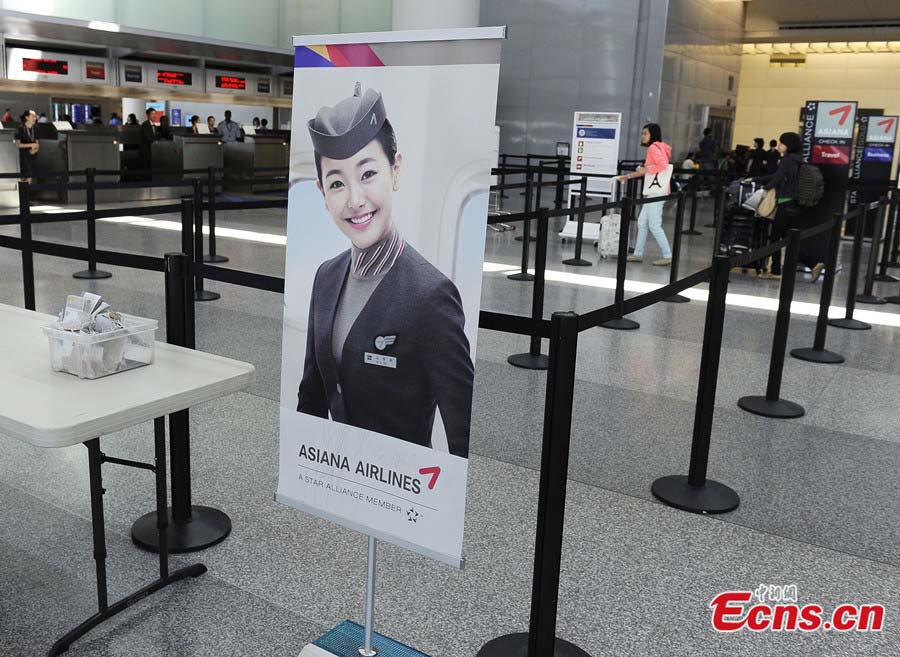 Asiana Airlines' flights to Beijing at San Francisco International Airport are back to normal on July 8, 2013, after the airport re-opens some international airlines. Due to a deadly crash on July 6, the airport was completely closed for all approaching and departing flights. Two Chinese schoolgirls were killed and 182 passengers injured in the crash. (Photo: crienglish/CNS)