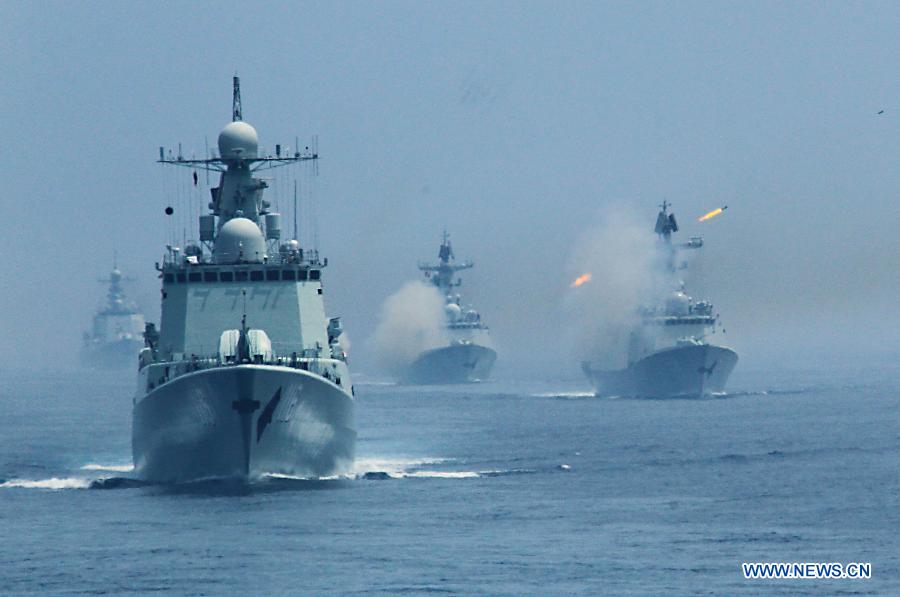 Chinese naval vessel fire anti-submarine missile during the "Joint Sea-2013" drill at Peter the Great Bay in Russia, July 10, 2013. The "Joint Sea-2013" drill participated by Chinese and Russian warships concluded here on Wednesday. (Xinhua/Zha Chunming)
