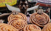 Bangladeshi Muslims buy food to break daytime fast