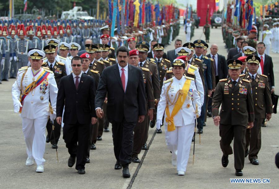 Venezuelan President Nicolas Maduro (C Front) takes part in the National Bolivarian Armed Forces military commands transmission ceremony at the Honor Courtyard of the Military Academy, in Caracas, Venezuela, on July 11, 2013. (Xinhua/AVN)