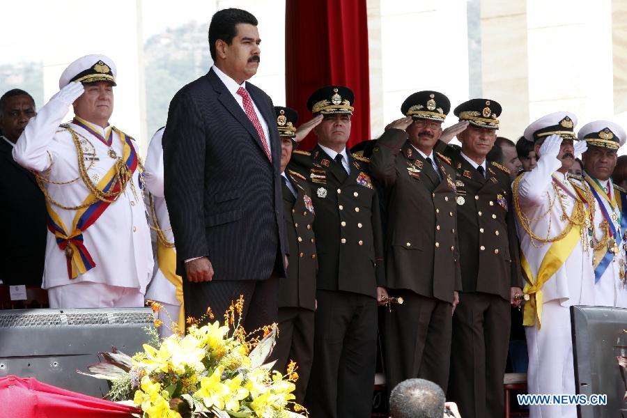 Venezuelan President Nicolas Maduro (L Front) takes part in the National Bolivarian Armed Forces military commands transmission ceremony at the Honor Courtyard of the Military Academy, in Caracas, Venezuela, on July 11, 2013. (Xinhua/AVN)