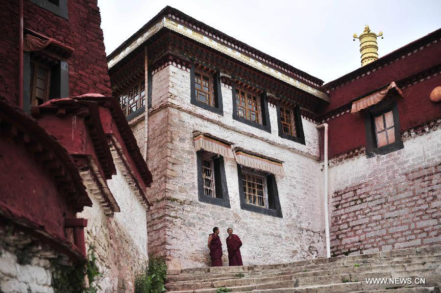 Photo taken on July 12, 2013 shows a view of the Gaden Monastery in Dagze County, southwest China's Tibet Autonomous Region. The Gaden Monastery, the first monastery of the Geluk school of Tibetan Buddhism, was set up in 1409. It was listed as one of the first batch of national key cultural relics protection units in 1961. (Xinhua/Liu Kun) 