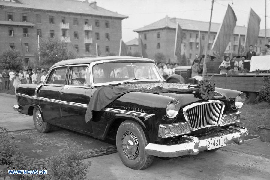 File photo taken on Aug. 1958 shows the country's first self-made limo Hongqi by the First Automotive Works Group (FAW) in China.(Xinhua)